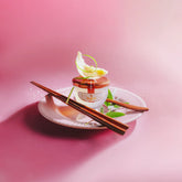 Pearl Collagen Premium Crystal Bird’s Nest on a decorative plate with chopsticks.